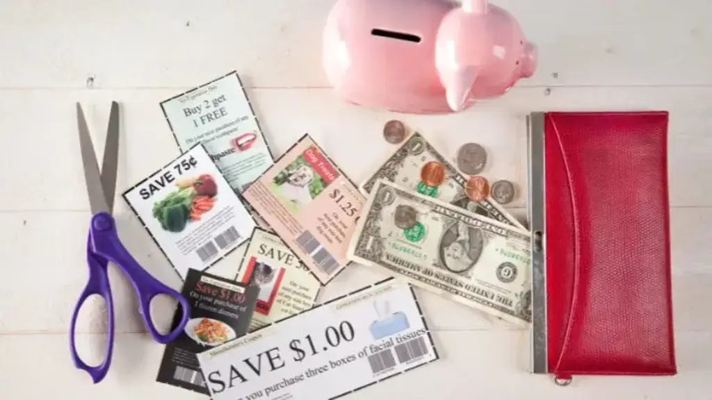 a piggy bank with coupons and money